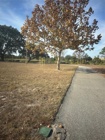 7712 LAKESIDE WOODLANDS, Hudson, FL 34667