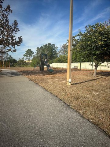 7712 LAKESIDE WOODLANDS, Hudson, FL 34667