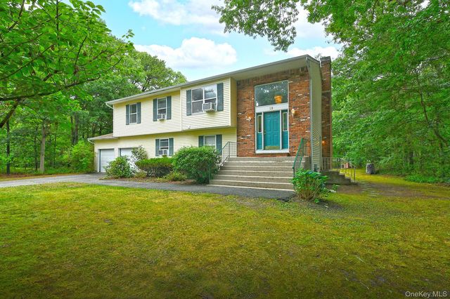 10 Woodbrook Circle, Holtsville, NY 11742