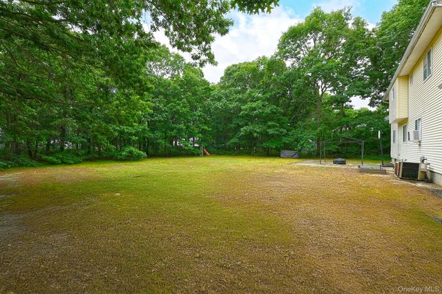 10 Woodbrook Circle, Holtsville, NY 11742