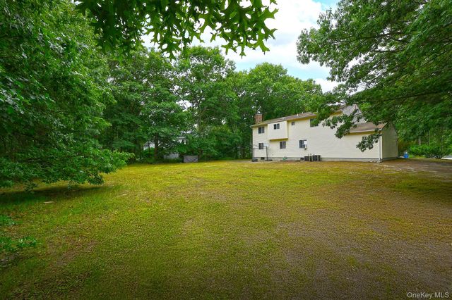 10 Woodbrook Circle, Holtsville, NY 11742