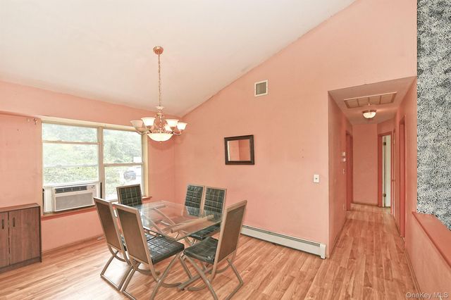 10 Woodbrook Circle, Holtsville, NY 11742