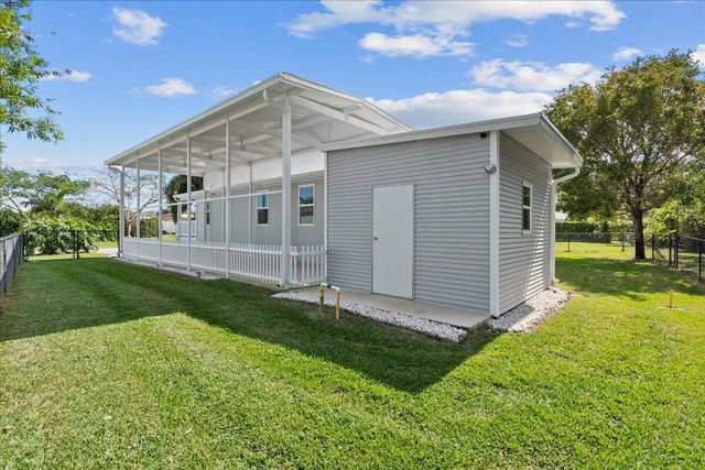 6877 SE Delegate Street, Hobe Sound, FL 33455