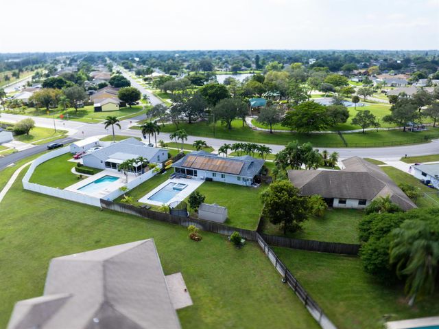 351 La Mancha Avenue, Royal Palm Beach, FL 33411