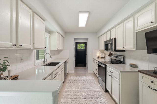 12739 Woodcreek Drive, Willis, TX 77318