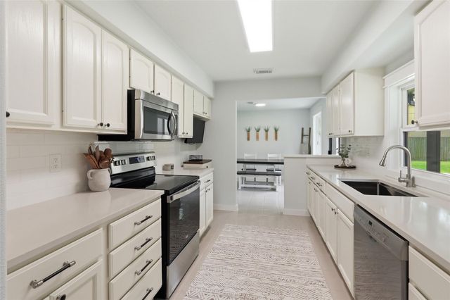 12739 Woodcreek Drive, Willis, TX 77318