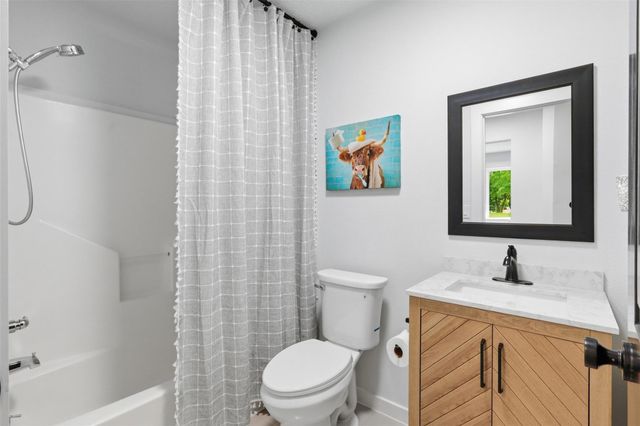 12739 Woodcreek Drive, Willis, TX 77318