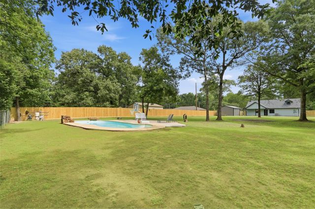 12739 Woodcreek Drive, Willis, TX 77318