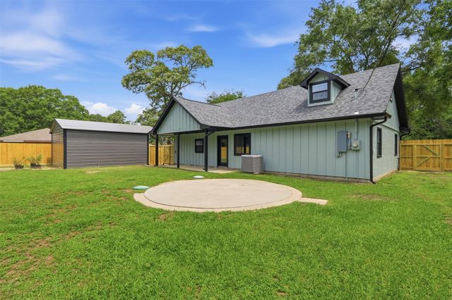12739 Woodcreek Drive, Willis, TX 77318