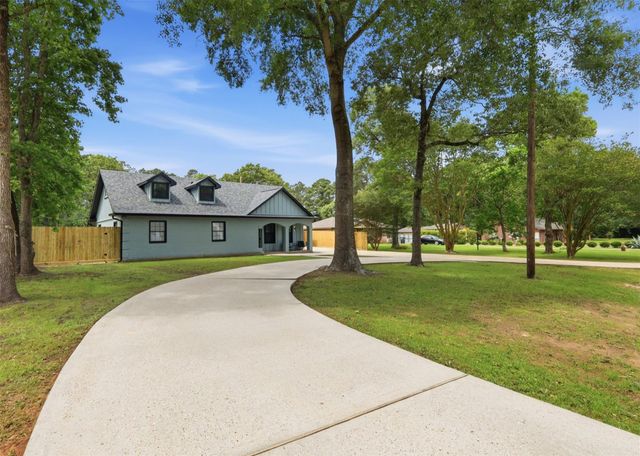 12739 Woodcreek Drive, Willis, TX 77318