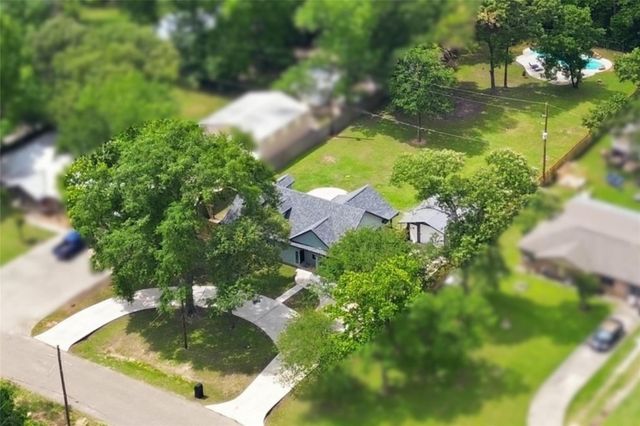 12739 Woodcreek Drive, Willis, TX 77318