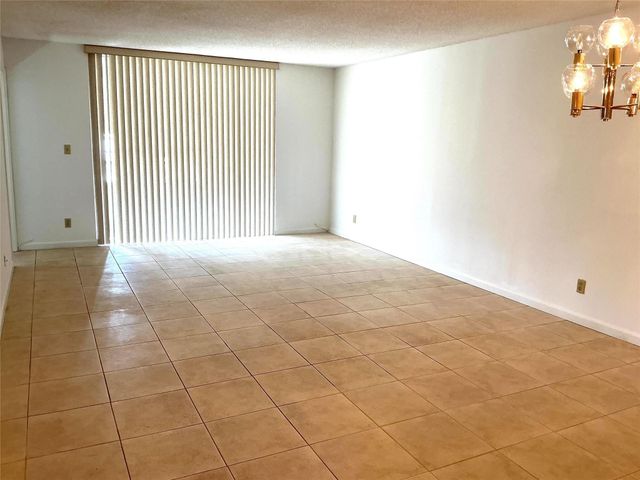 9481 Sunrise Lakes Boulevard 102, Sunrise, FL 33322