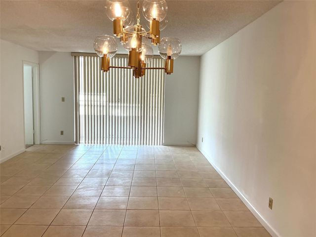 9481 Sunrise Lakes Boulevard 102, Sunrise, FL 33322
