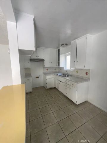 1805 Rimpau, Los Angeles, CA 90019