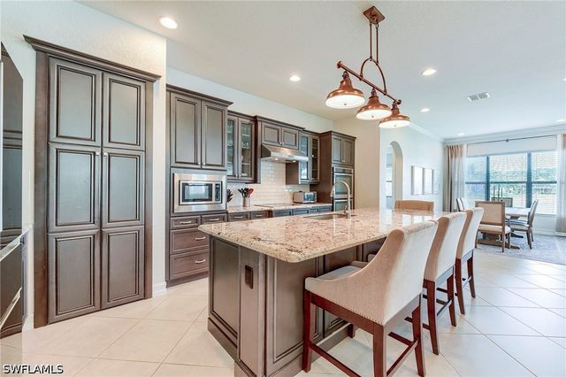9335 Woodhurst DR, Naples, FL 34120
