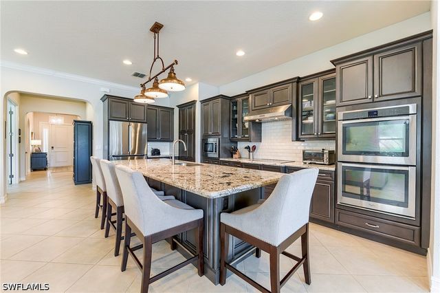 9335 Woodhurst DR, Naples, FL 34120