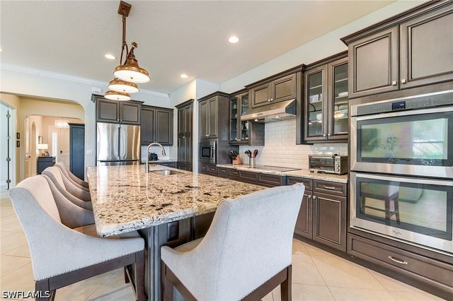 9335 Woodhurst DR, Naples, FL 34120