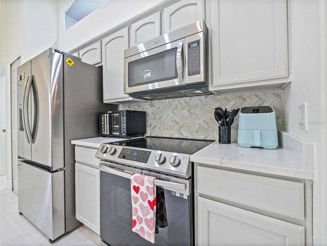 9555 HERON POINTE DRIVE, Orlando, FL 32832