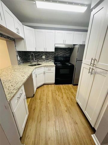 8211 SUN SPRING CIRCLE 42, Orlando, FL 32825