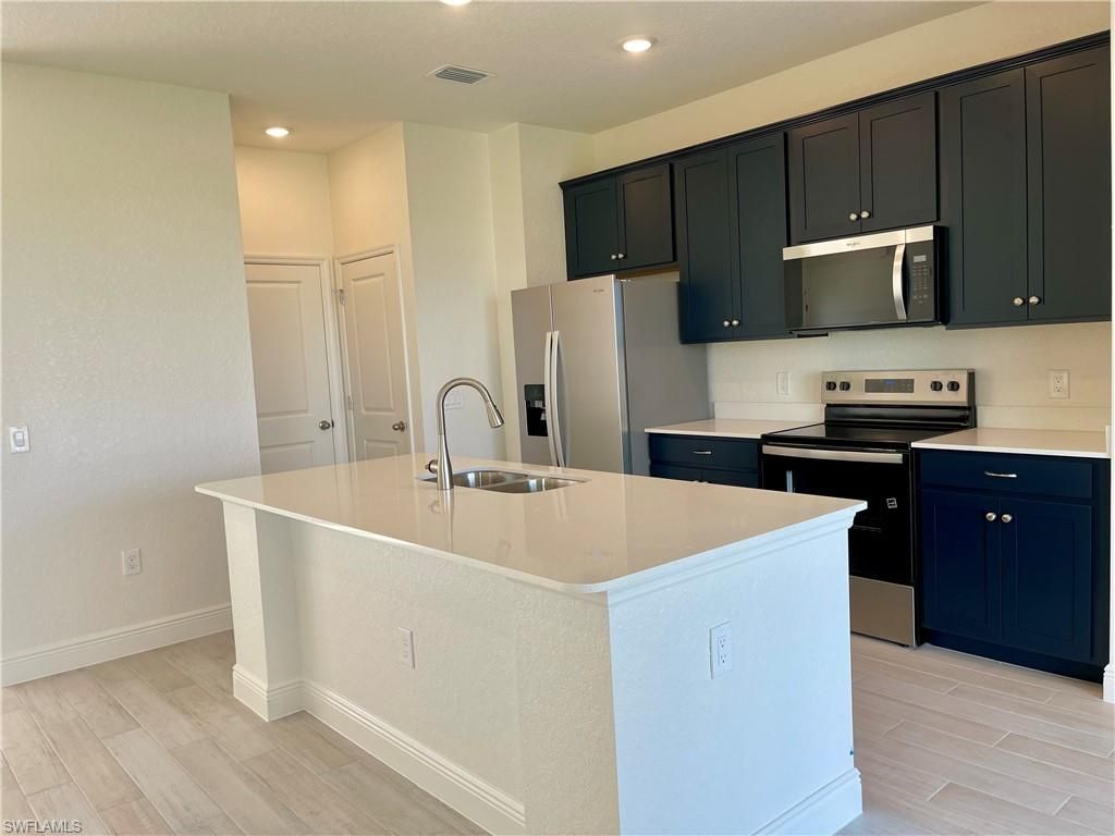 Image 3 of property listing at 4020 NW 36th PL, Cape Coral, FL 33993