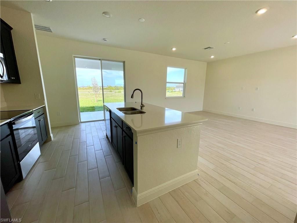 Image 5 of property listing at 4020 NW 36th PL, Cape Coral, FL 33993