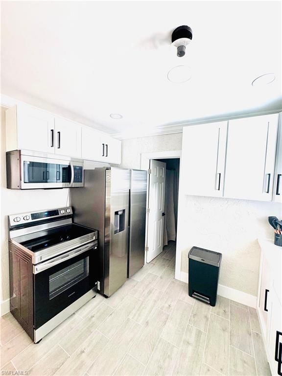 127-129 Fairweather LN, FORT MYERS BEACH, FL 33931 — photo 5