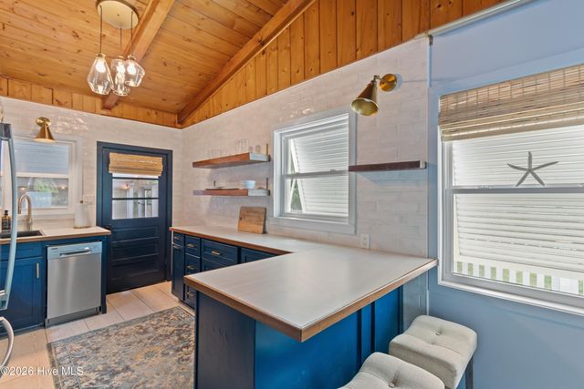 318 NE 58th Street, Oak Island, NC 28465
