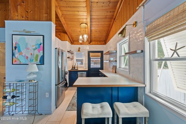 318 NE 58th Street, Oak Island, NC 28465