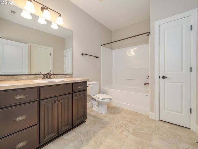5818 Nw BANNISTER Dr, Portland, OR 97229