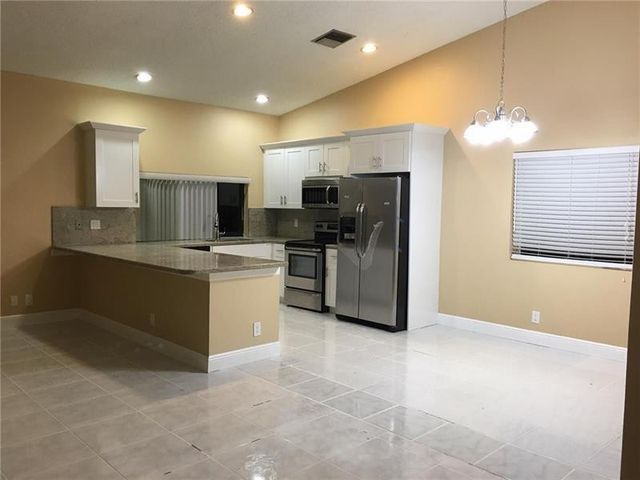 9555 NW 25th Court, Coral Springs, FL 33065