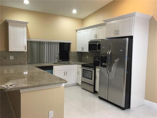 9555 NW 25th Court, Coral Springs, FL 33065