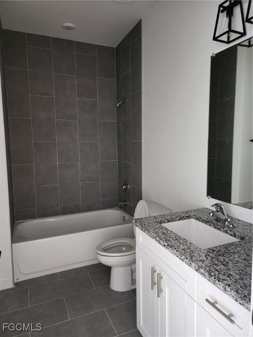 2431 Lola AVE S, Lehigh Acres, FL 33973