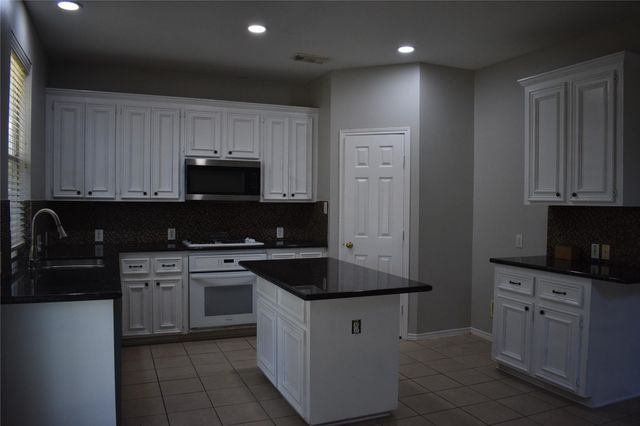 4214 Creek Ridge Lane, Missouri City, TX 77459