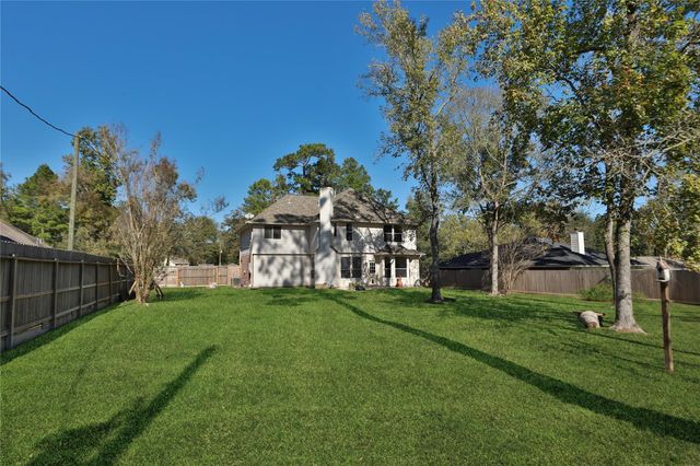 7019 Revelwood Drive, Magnolia, TX 77354