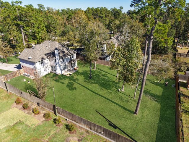 7019 Revelwood Drive, Magnolia, TX 77354