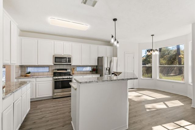 7019 Revelwood Drive, Magnolia, TX 77354