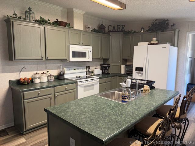 608 W Curtis, Calera, OK 74730