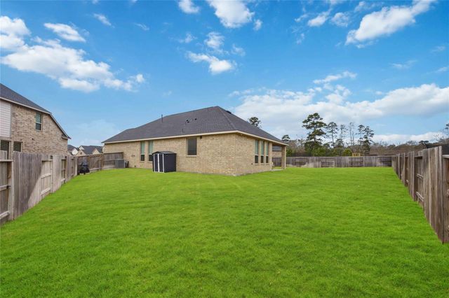 1301 Knollbridge Point Lane, Pinehurst, TX 77362