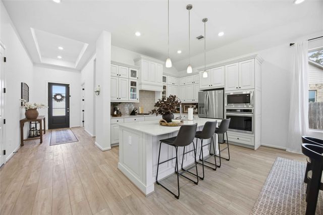 1301 Knollbridge Point Lane, Pinehurst, TX 77362