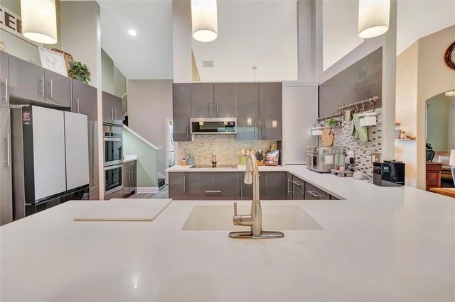 10446 JARDIM DE LARGO STREET, Clermont, FL 34711