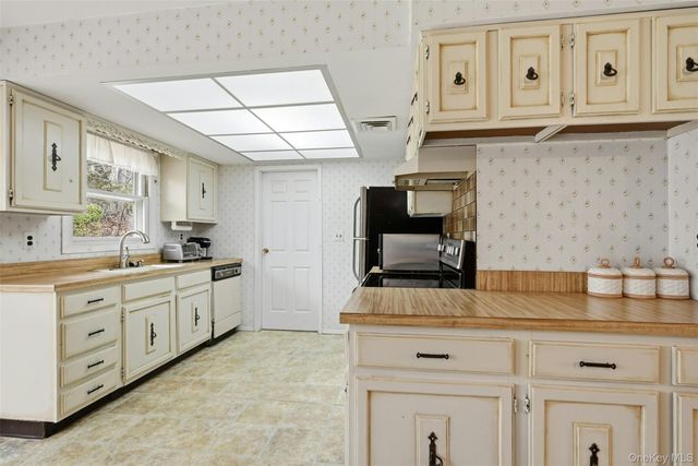 705 Brewster Drive, Port Jefferson, NY 11777