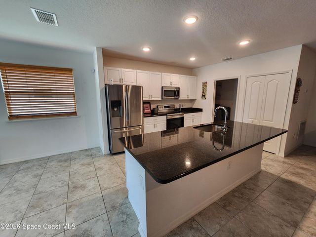 261 Wisteria Avenue NW, Palm Bay, FL 32907