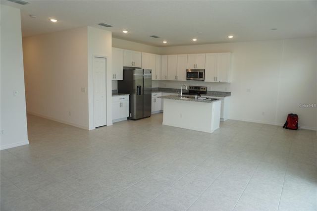 1677 WAY OF PEACE LANE, Mascotte, FL 34753