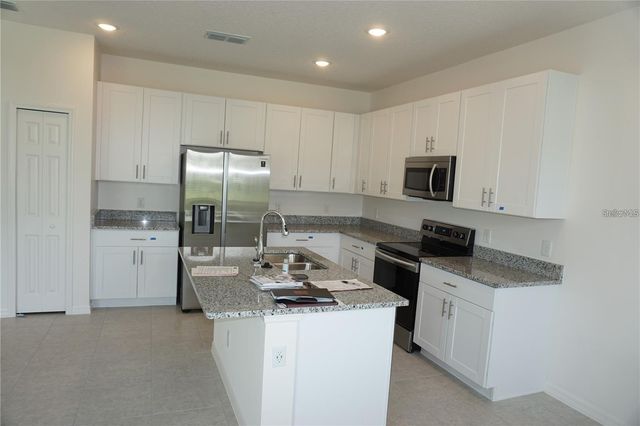 1677 WAY OF PEACE LANE, Mascotte, FL 34753