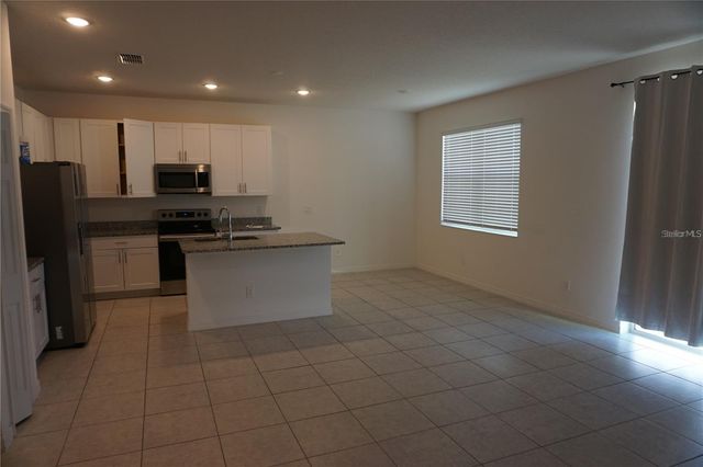 1677 WAY OF PEACE LANE, Mascotte, FL 34753