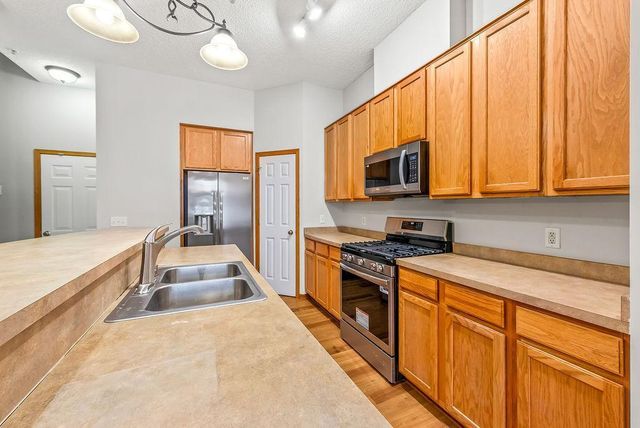 11780 Vermillion Street NE E, Blaine, MN 55449