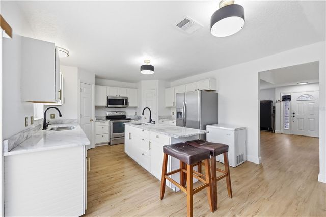 627 WOODLAND CREEK BOULEVARD, Kissimmee, FL 34744