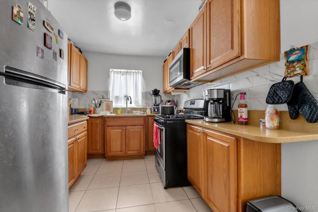 93-12 89th Avenue, Woodhaven, NY 11421