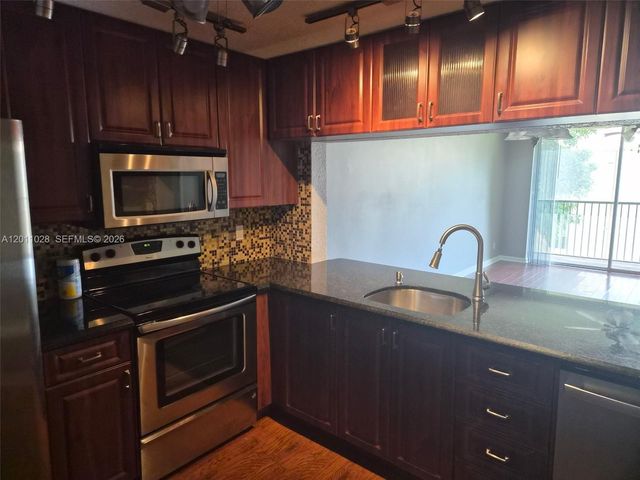 7175 Orange Drive 203H, Davie, FL 33314