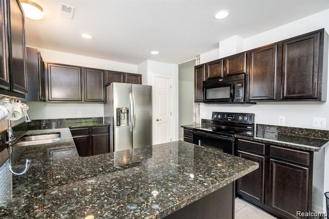 29406 Woodpark Circle, Warren, MI 48092